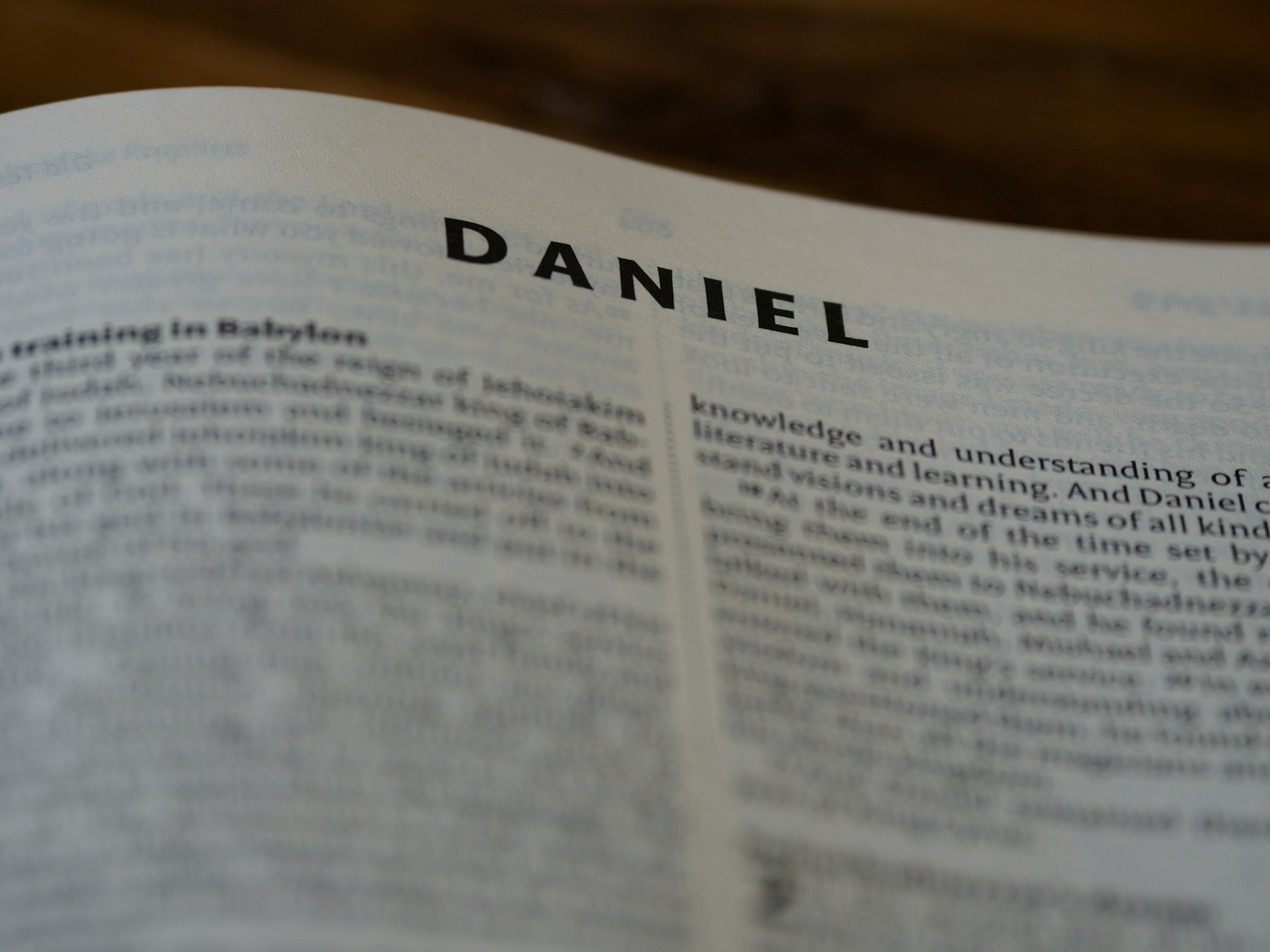 a close up of an open book on a table